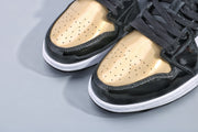 Jordan 1 Low Gold Toe Black and Metallic Gold Sneakers