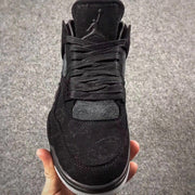 Jordan 4 KAWS Graffiti Black High-Top Sneakers