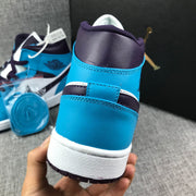 Air Jordan 1 Mid Sneakers in Blue, White and Black