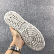 Air Jordan 1 Mid Sneakers in White and Grey