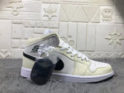 Jordan Air 1 Mid Sneakers Cream White and Black
