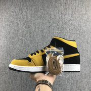 Air Jordan 1 Mid Black and Yellow Sneakers
