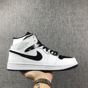 Air Jordan 1 Mid White and Black Sneakers