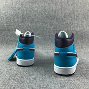 Air Jordan 1 Mid Sneakers in Blue, White and Black