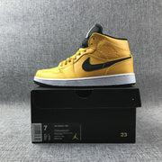 Air Jordan 1 Mid University Gold Black White Sneakers