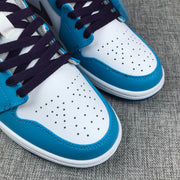 Air Jordan 1 Mid Sneakers in Blue, White and Black