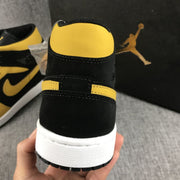 Air Jordan 1 Mid Black and Yellow Sneakers