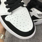 Jordan Air Jordan 1 Mid Black White Sneakers 554724-113