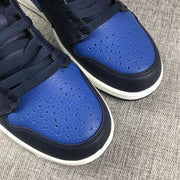 Air Jordan 1 Mid Black and Royal Blue High-Top Sneakers