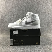 Jordan Air Jordan 1 Mid GS White and Silver Sneakers