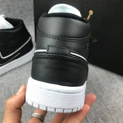 Air Jordan 1 Mid Black and White Sneakers 852542-016