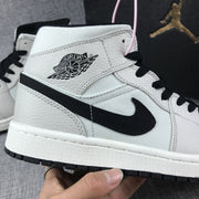 Air Jordan 1 Mid Grey and Black High-Top Sneakers