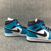 Air Jordan 1 Mid Sneakers in Blue, White and Black