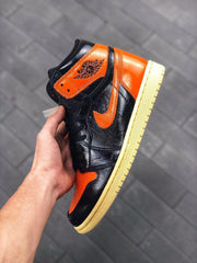 Air Jordan 1 Retro High OG Black and Orange Sneakers
