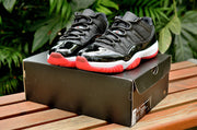 Jordan Air Jordan 11 Retro Low Black and Red Sneakers