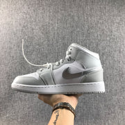 Jordan Air Jordan 1 Mid GS White and Silver Sneakers