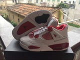 Jordan 4 Retro White and Red High-Top Sneakers