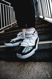 Air Jordan 11 Iridescent Sneakers in White and Black