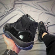 Air Jordan 11 Cap and Gown Black High-Top Sneakers