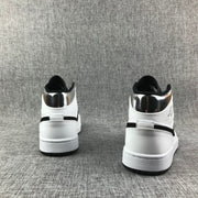Air Jordan 1 Mid White and Black Sneakers