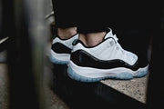 Air Jordan 11 Iridescent Sneakers in White and Black