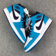 Air Jordan 1 Mid Sneakers in Blue, White and Black