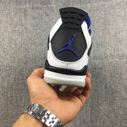 Jordan Air Jordan 4 Sneakers in White, Black and Blue