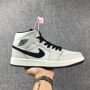 Air Jordan 1 Mid Grey and Black High-Top Sneakers