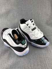 Jordan 11 Low Sneakers in White and Black
