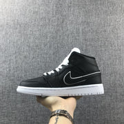Air Jordan 1 Mid Black and White Sneakers 852542-016